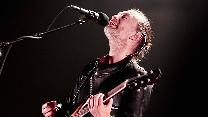 Lead singer Tom Yorke of the British band Radiohead performs on stage during a concert at the Heineken Music Hall in Amsterdam, on 20 May, 2016. Photo: AFP