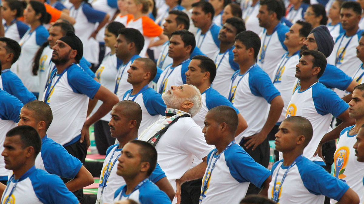 India’s Prime Minister Narendra Modi © performs yoga during World Yoga Day in Chandigarh, India. Photo : Reuters