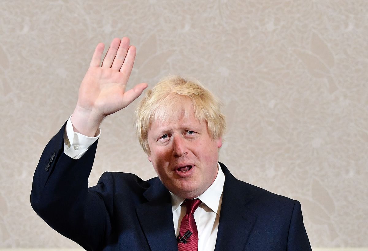 Brexit campaigner and former London mayor Boris Johnson waves after addressing a press conference in central London on June 30. Photo: AFP