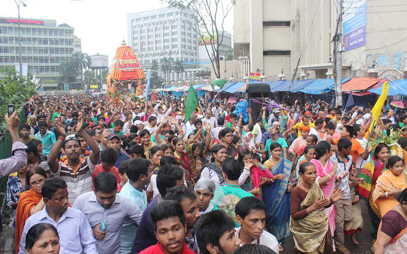 Devotees pull the rope of Ratha on the capital on Wednesday. Photo: Focus Bangla