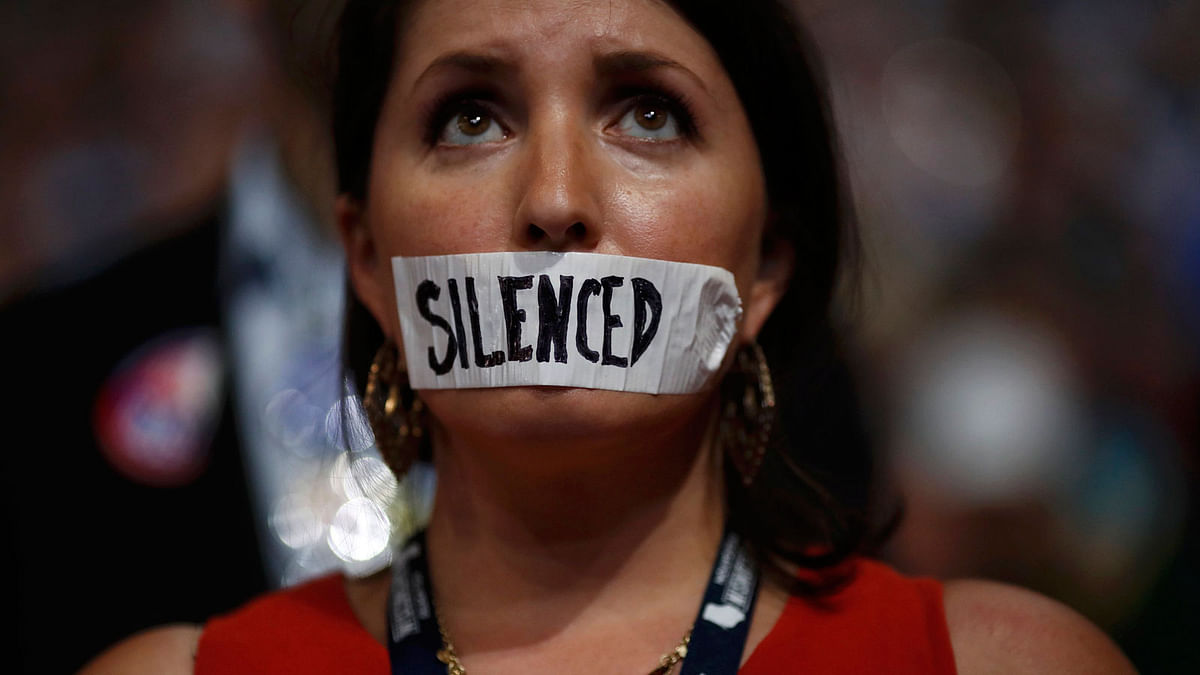 A supporter of former Democratic US presidential candidate Bernie Sanders wears tape across her mouth in protest on the floor at the Democratic National Convention in Philadelphia, Pennsylvania, US on Monday. Photo: Reuters