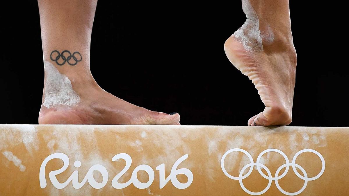 Close up of the feet of Rebecca Downie (GBR) of United Kingdom as she trains on the beam.