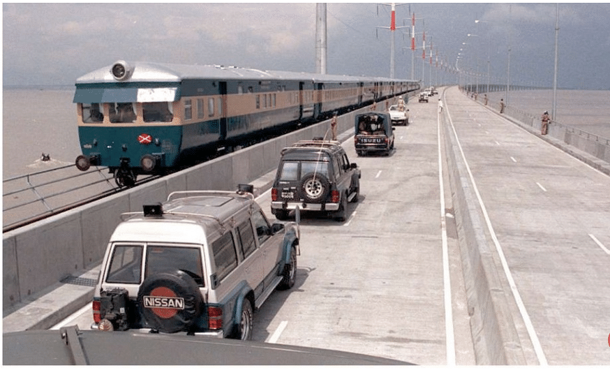 A train crosses a bridge over the Jamuna river in northwestern Bangladesh. China Railway Group said it won a US$3.1 billion project to build a rail network in the country. Photo: AFP