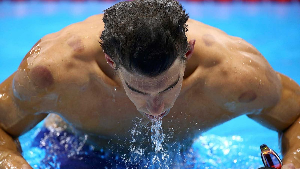 Michael Phelps (USA) of USA competes on the way to winning the gold medal. Photo: Reuters