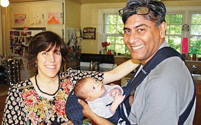 Tareque Masud and Catherine Masud with their son.