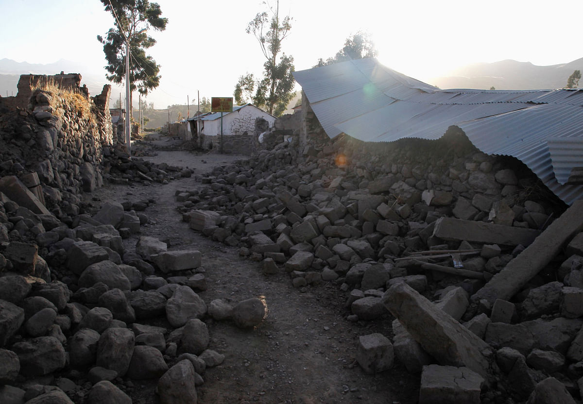 The collapsed walls of houses are pictured after a 5.3 magnitude shallow earthquake rocked the Andean region Arequipa, in Yanque, Peru on Monday. Photo: Reuters