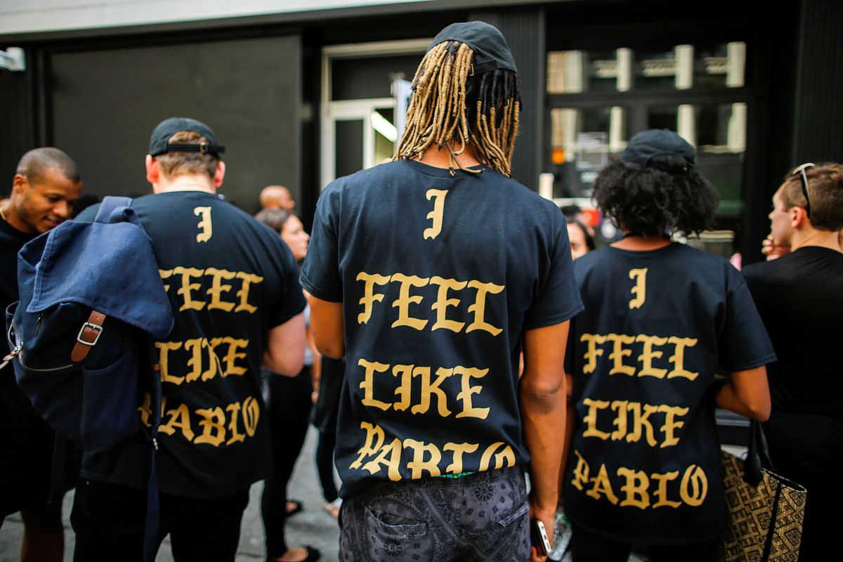 People wear `The life of Pablo` merchandise after visiting the pop up store featuring fashion by Kanye West in Manhattan, New York, US. Photo: Reuters