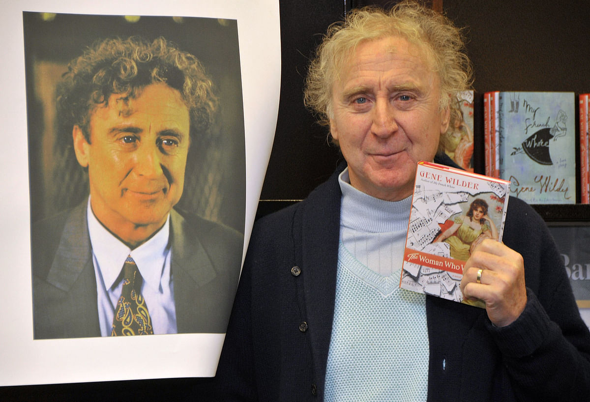 Cap: This file photo taken on 17 March, 2008 shows actor and author Gene Wilder posing with copies of his new book 'The Woman Who Wouldn't' at Barnes & Noble Bookstore at The Grove in West Hollywood, California. Photo: AFP