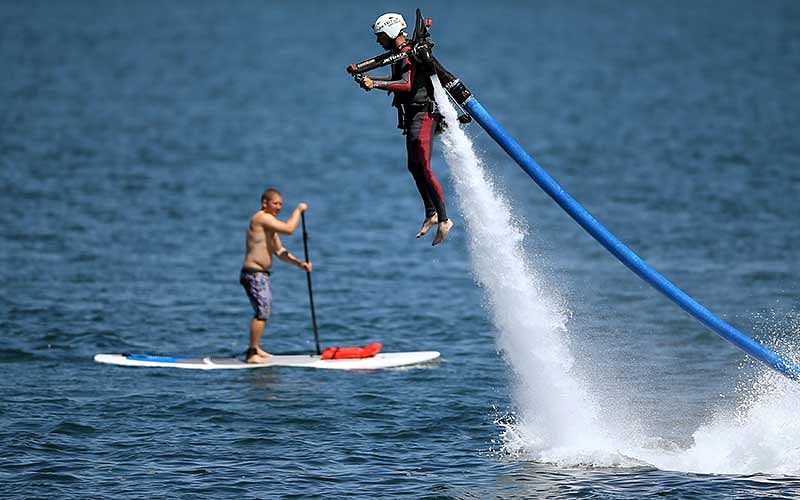 U.S. military veteran Joshua Alves shoots out of the ocean on a water jetboard as part of an event by Warrior Passion, a charity that helps adjusting U.S. veterans, and Jetpack America to assist veterans in overcoming their challenges through shared adventure and fun in San Diego, California, U.S. September 14, 2016. Photo: Reuters