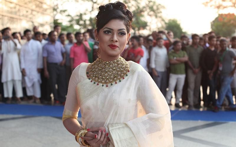 Actress Tisha wears Saree in typical Bengali style at Meril-Prothom Alo award reception on 08 May 2015. Photo--Monirul Alam