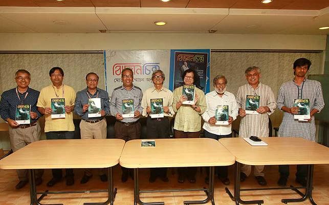 Munir Hasan, Sajjad Sharif, Abdul Kaiyum, Mohammad Kaykobad, Rezaur Rahman, Mohammad Ibrahim, Siddique-e Rabbani, Anisul Hoque and Abul Basar (from left) hold the copies of science magazine Biggan Chinta at its cover unwrapping ceremony at Prothom Alo office on Saturday. Photo: Ashraful Alam