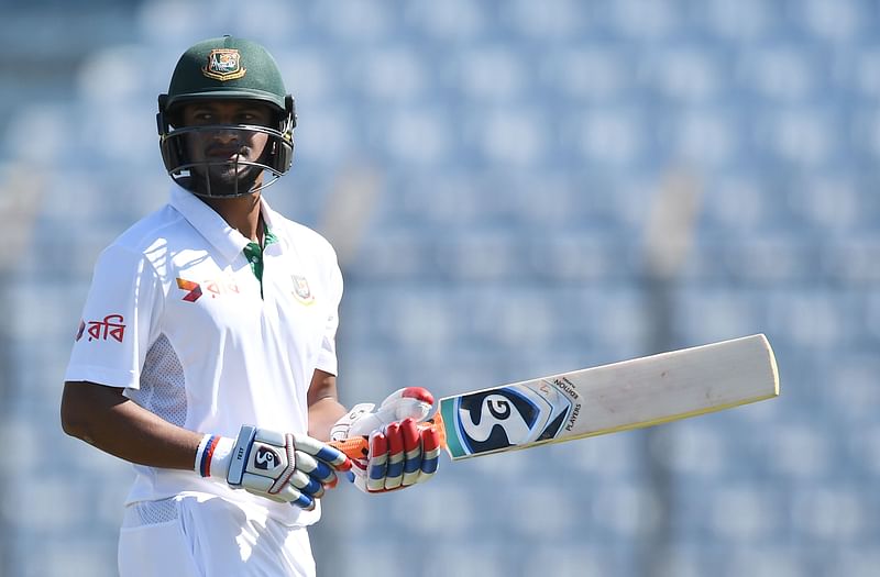 Bangladesh's Shakib Al Hasan reacts after losing his wicket during the third day's play of the first Test cricket match between Bangladesh and England at Zahur Ahmed Chowdhury Cricket Stadium in Chittagong on October 22, 2016. Photo: AFP