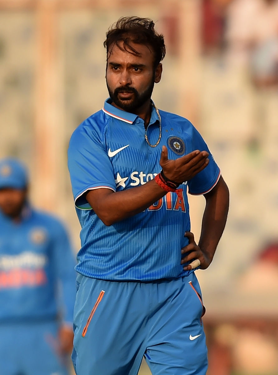 India's Amit Mishra gestures after delivering the ball. AFP file photo