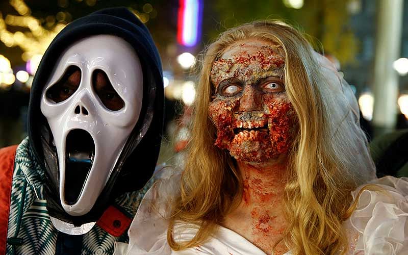 A zombie bride poses for selfies during the so-called `zombie walk` on Halloween Day in Essen, Germany. Photo: Reuters