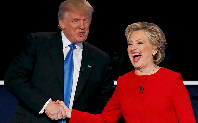 Republican US presidential nominee Donald Trump shakes hands with Democratic US presidential nominee Hillary Clinton at the conclusion of their first presidential debate at Hofstra University in Hempstead. Photo: Reuters