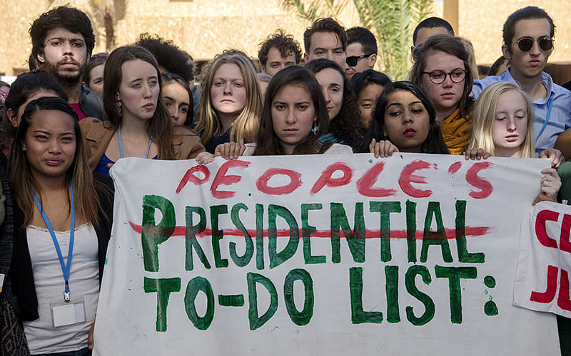 American students protest outside the UN climate talks during the COP22 international climate conference in Marrakesh in reaction to Donald Trump`s victory in the US presidential election, on November 9, 2016. Photo: AFP