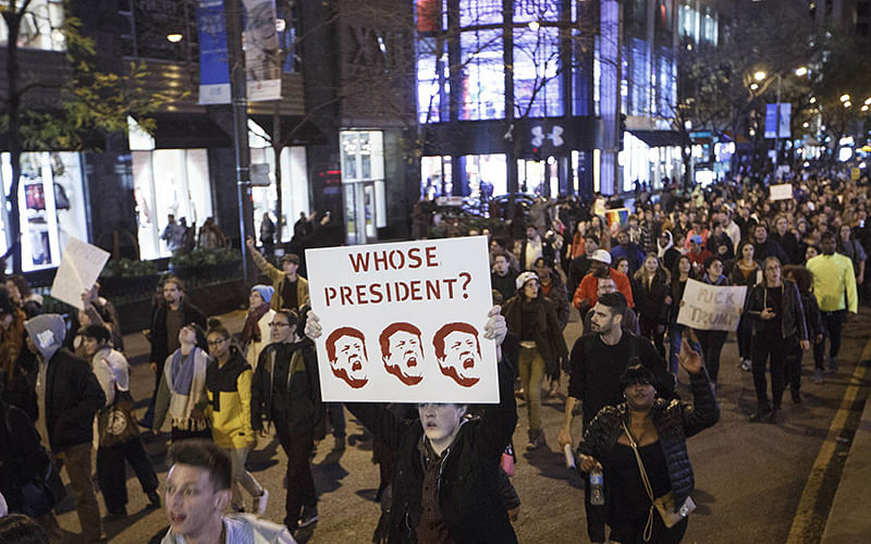 Demonstrators protest on Michigan Avenue November 9, 2016 in Chicago, Illinois. Thousands of people across the United States took to the streets in protest a day after Republican Donald Trump was elected president, defeating Democrat Hillary Clinton. Photo: AFP