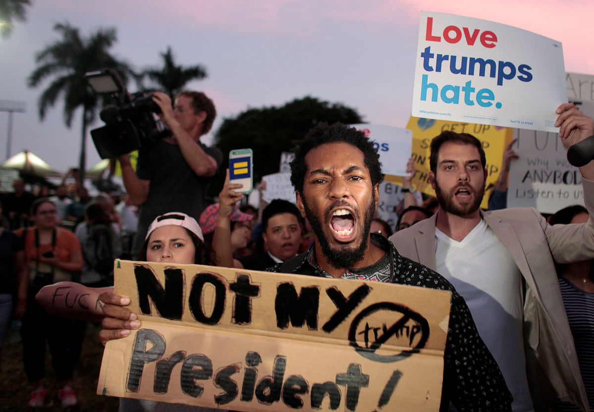 People protest against US President-elect Donald Trump in Miami. Photo: Reuters