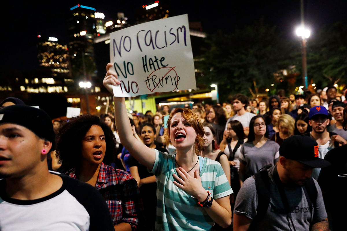 Demonstrators protest outside of City Hall following the election of Republican Donald Trump as President of the United States in downtown Los Angeles, California. Photo: Reuters