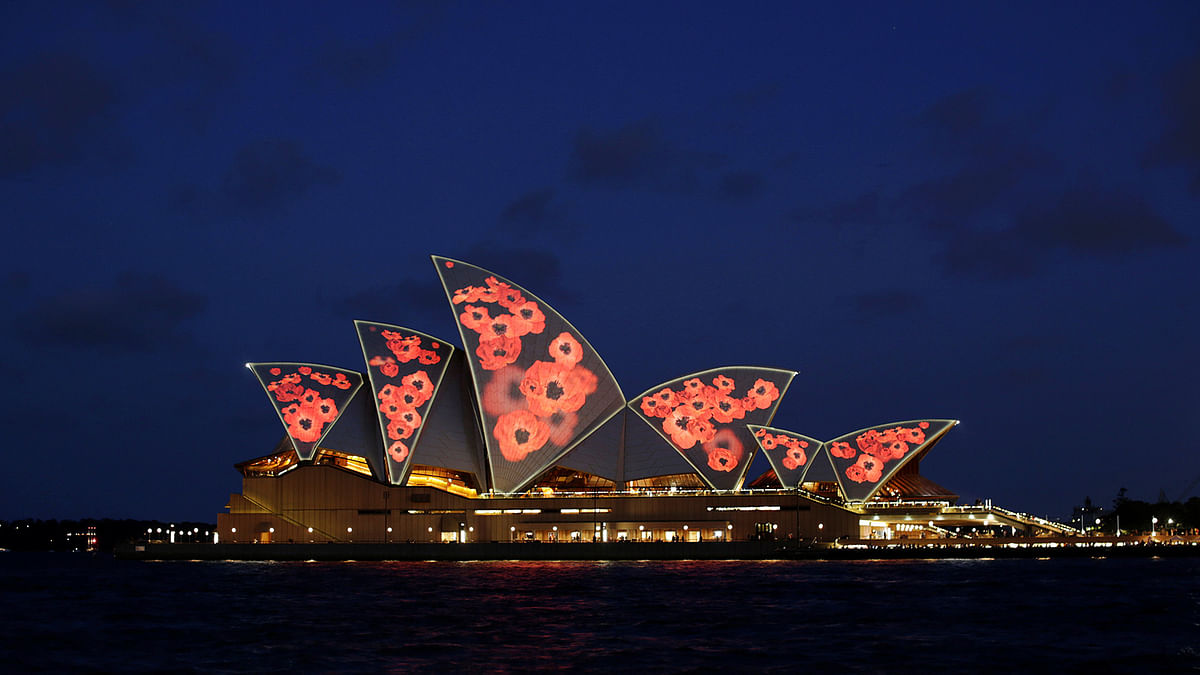 The sails of the the Sydney Opera House are lit with poppies commemorating the armistice ending World War One on Remembrance Day in Sydney, Australia November 11, 2016.