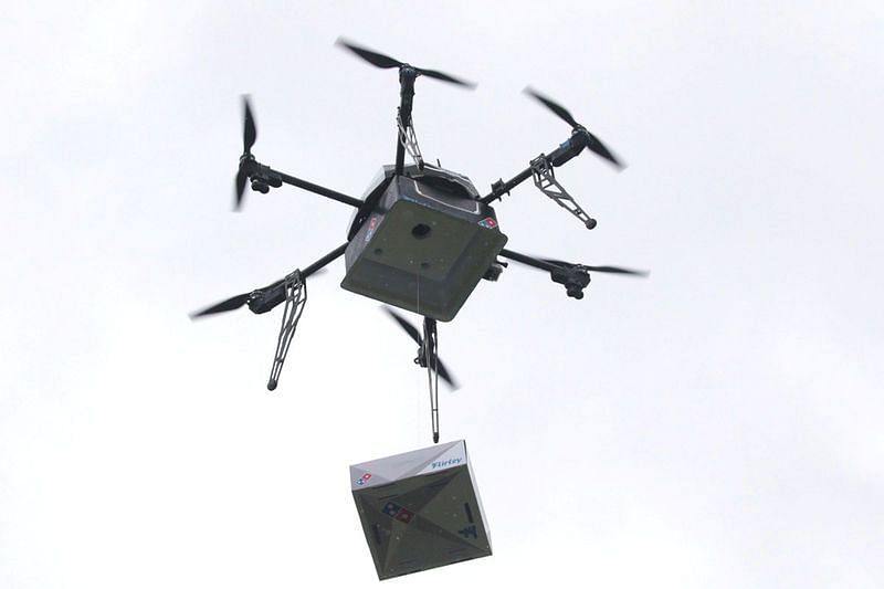 A delivery drone performs a test flight with a Domino's pizza box in Auckland, New Zealand, 25 August, 2016. Photo: Reuters