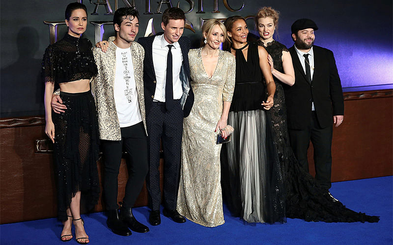 Writer JK Rowling poses with members of the cast as they arrive for the European premiere of the film `Fantastic Beasts and Where to Find Them` at Cineworld Imax, Leicester Square in London. Photo: Reuters