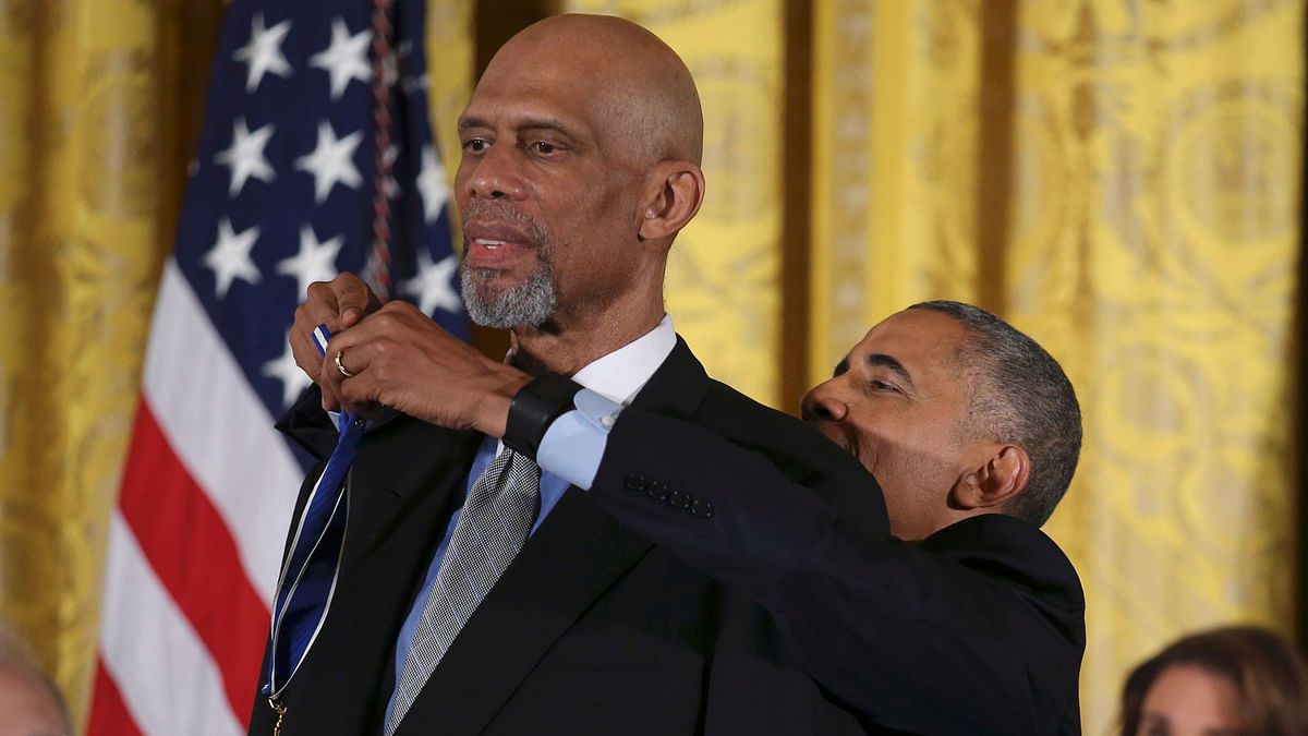 US President Obama presents the Presidential Medal of Freedom to Abdul-Jabbar during ceremony at the White House in Washington. Photo: Reuters