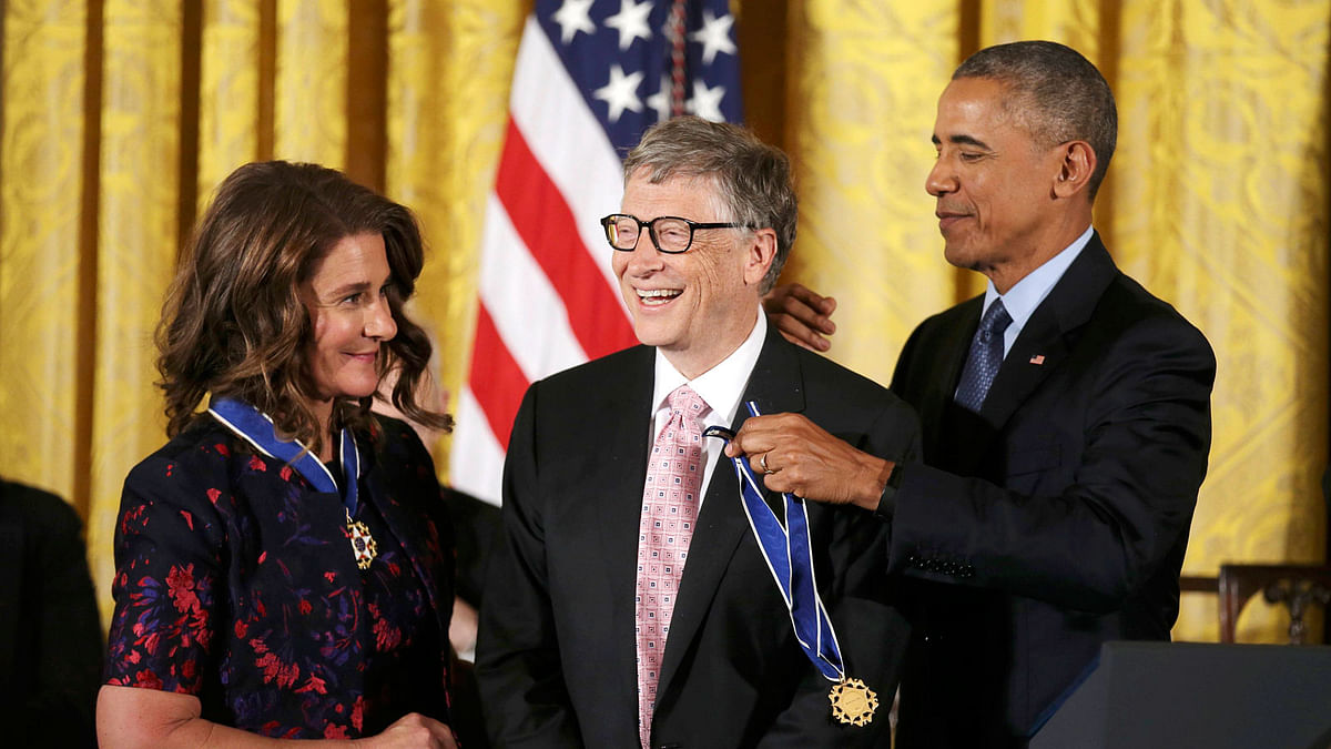 Bill and Melinda Gates receive medals from President Obama at Presidential Medal of Freedom ceremony at White House in Washington. Photo: Reuters