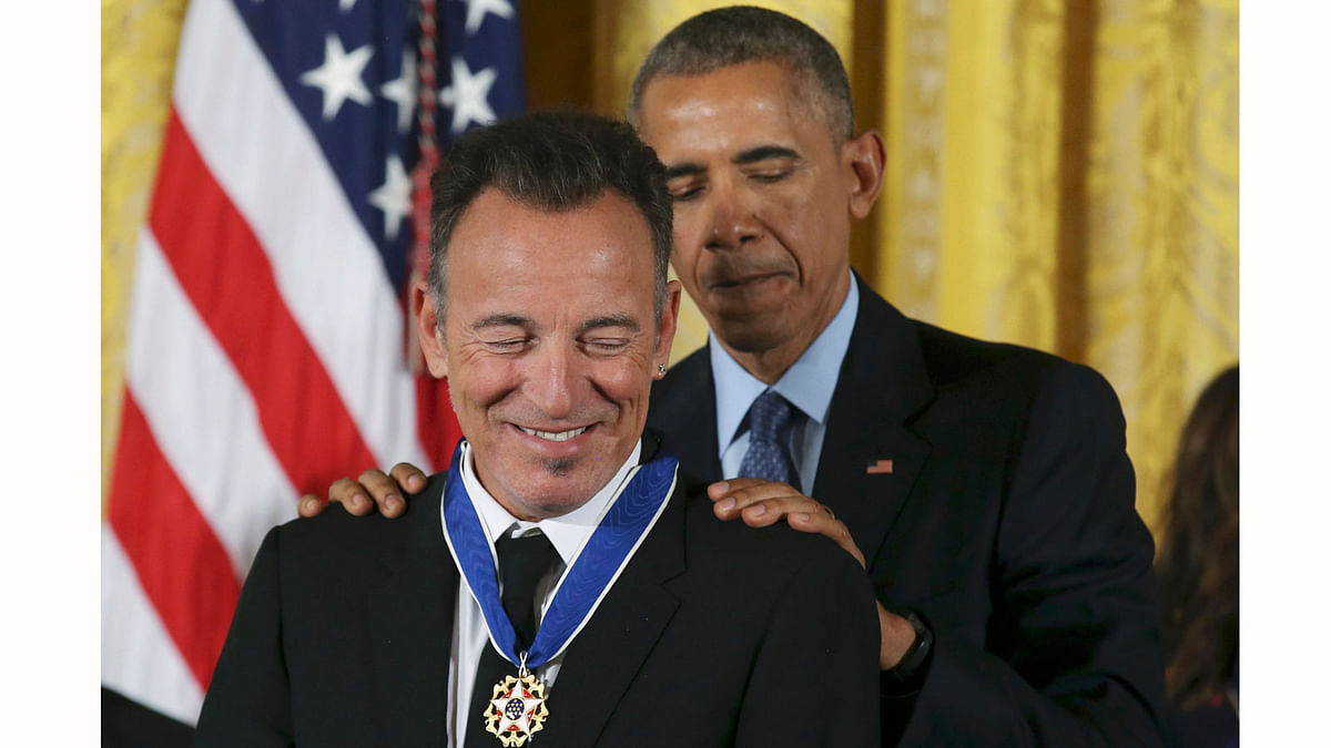 US President Obama presents the Presidential Medal of Freedom to musician Springsteen during ceremony at the White House in Washington. Photo: Reuters