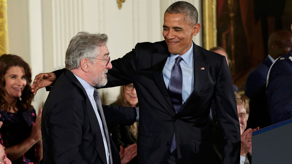 US President Obama greets actor De Niro during Presidential Medal of Freedom ceremony at the White House in Washington. Photo: Reuters