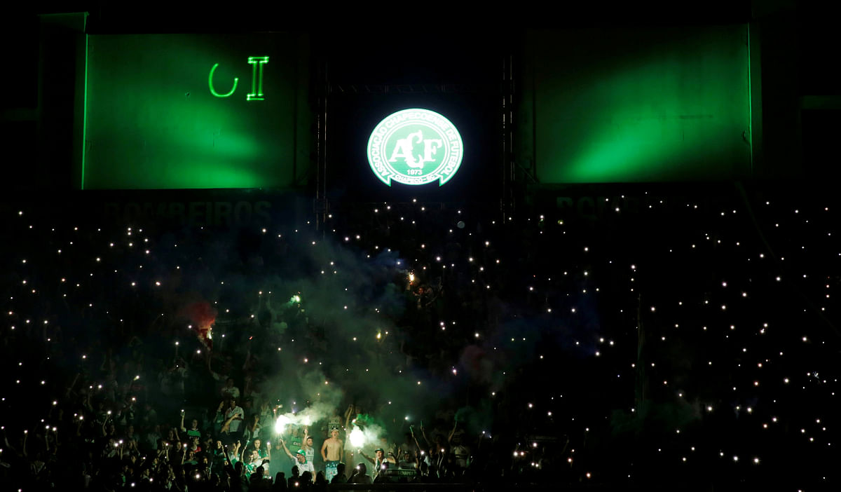 Fans of Chapecoense soccer team pay tribute to Chapecoense`s players at the Arena Conda stadium in Chapeco. Photo: Reuters