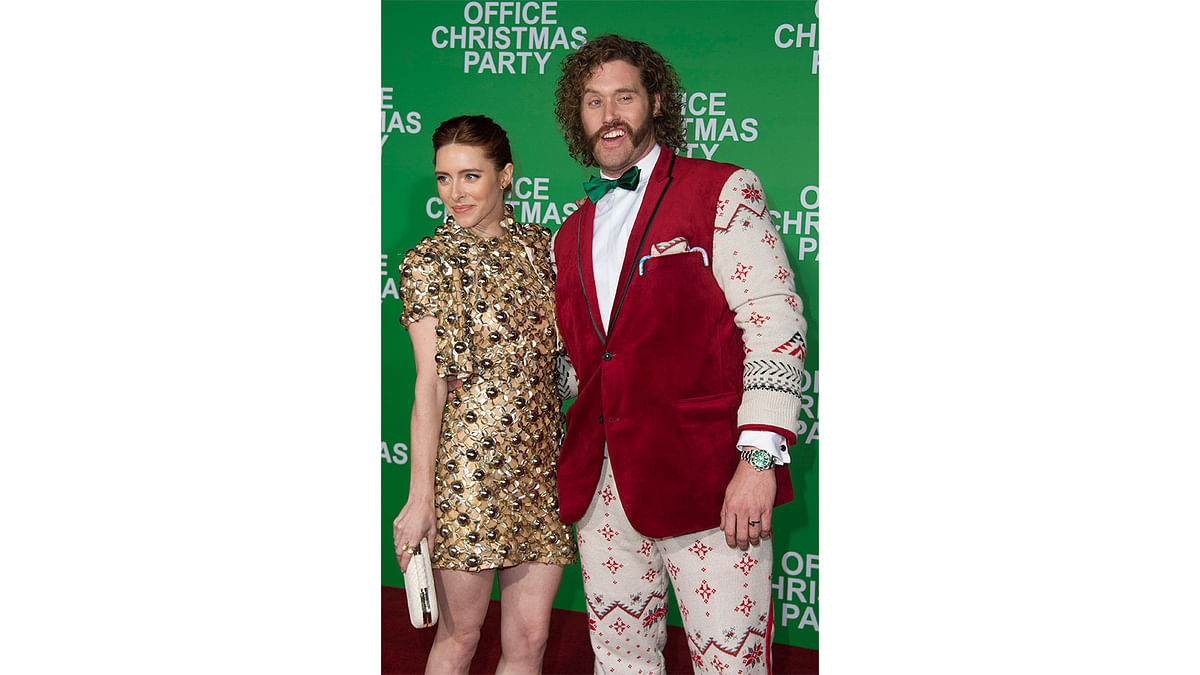 Actor T. J. Miller (R) and guest arrive for the premiere of `Office Christmas Party` at the Regency Village Theater in Los Angeles on December 7, 2016. Photo: AFP