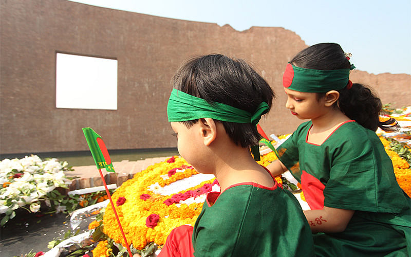 Two children pay homage at Intellectuals Memorial in Rayerbazar on 14 December, marking Martyred Intellectuals Day. Photo: Abdus Salam