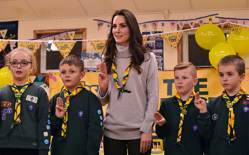 Britain`s Catherine, Duchess of Cambridge (C), reads the Scouts promise during a Cub Scout Pack meeting with cubs from the Kings Lynn District, in Kings Lynn, Britain, December 14, 2016, during an event to celebrate 100 years of Cubs. Photo: Reuters