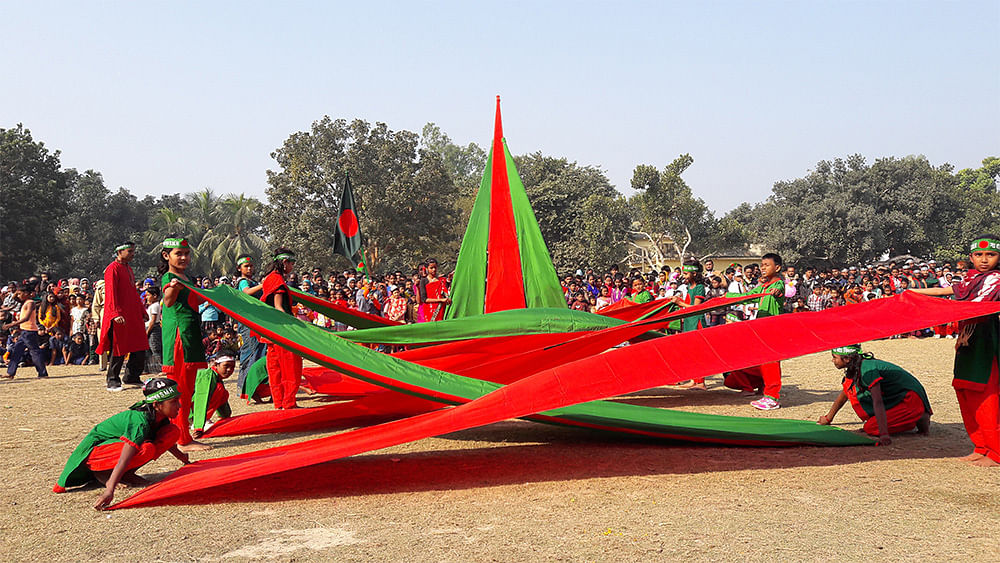 Children perform to celebrate the 46th Victory Day on Friday.