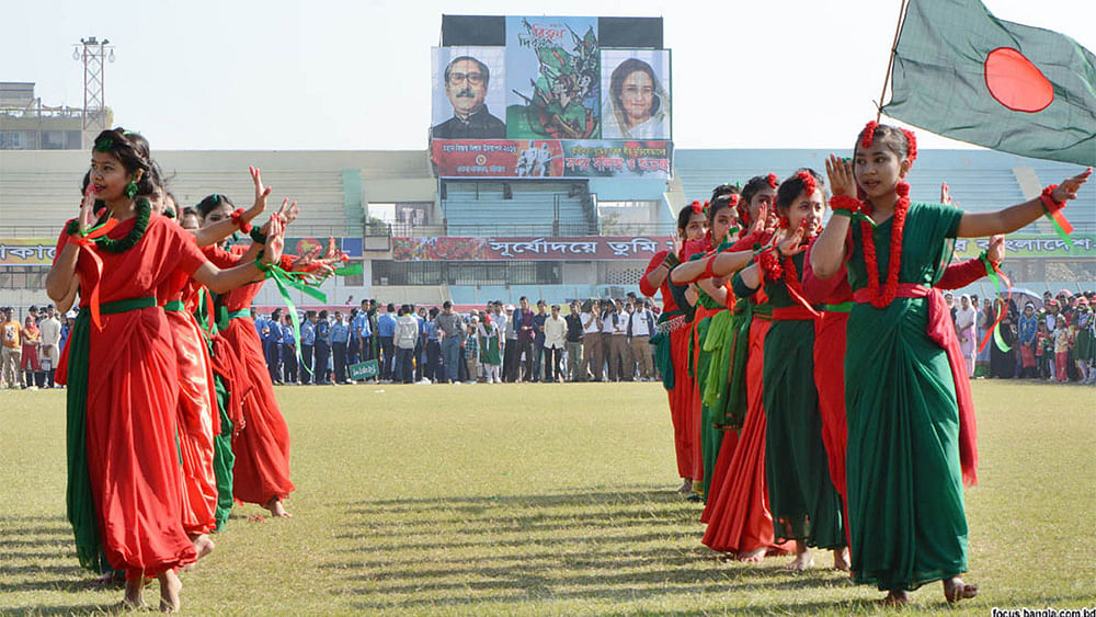 Children perform on MA Aziz Stadium grounds celebrating the 46th Victory Day on Friday. Photo: Focus Bangla