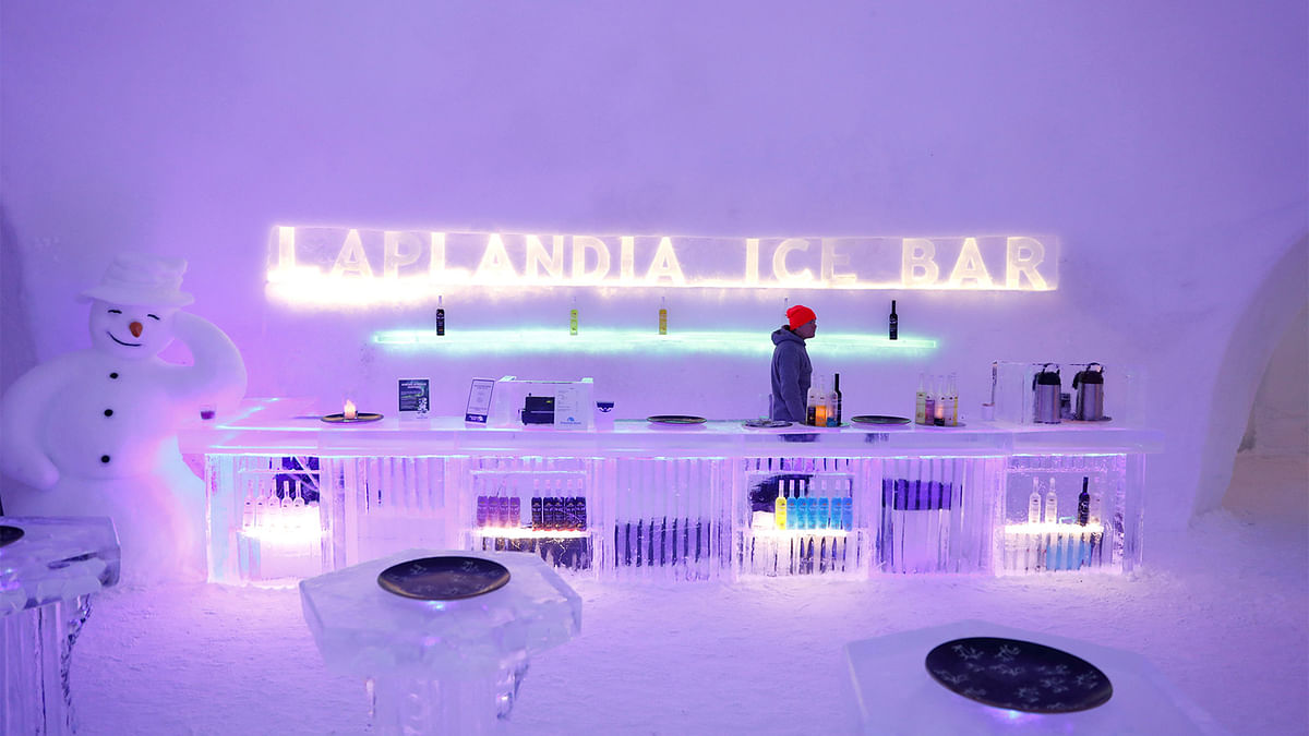 A barman waits for customers at the Arctice ice bar in the Santa Claus Village in the Arctic Circle near Rovaniemi, Finland. Photo: Reuters