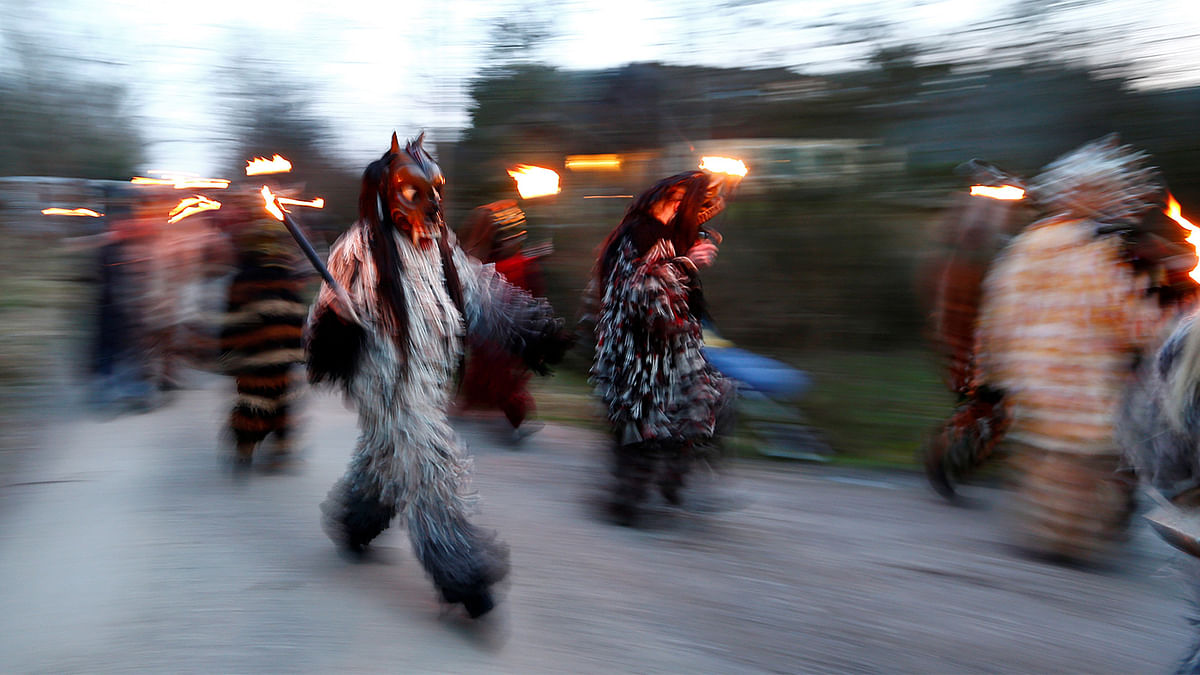 Costumed participants perform during a traditional Perchtenlauf near Munich, Germany, December 17, 2016. Reuters