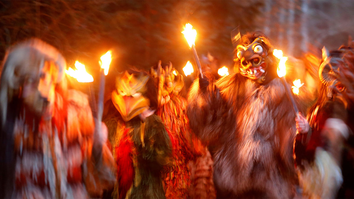 Costumed participants perform during a traditional Perchtenlauf in Munich of Germany, December 17, 2016. Reuters