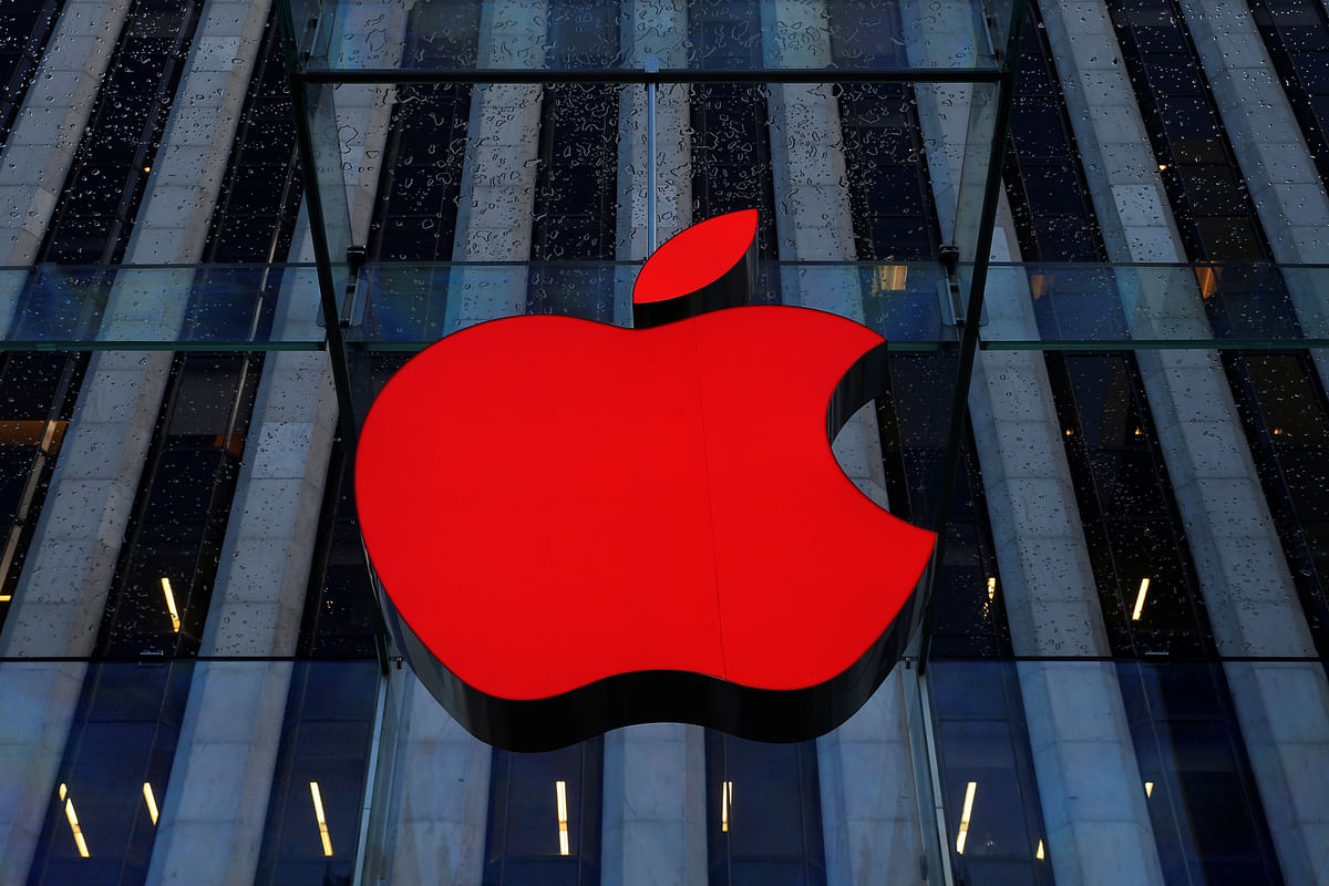 An Apple logo hangs above the entrance to the Apple store on 5th Avenue in the Manhattan borough of New York. Photo: Reuters