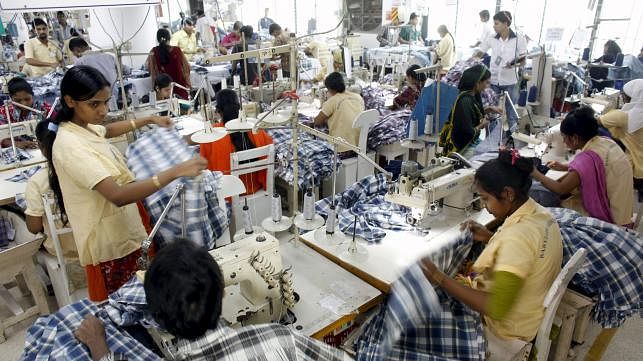 File photo of employees working in a factory in Dhaka. Reuters