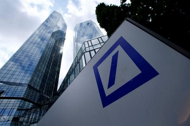A Deutsche Bank logo adorns a wall at the company`s headquarters in Frankfurt, Germany. Photo: Reuters