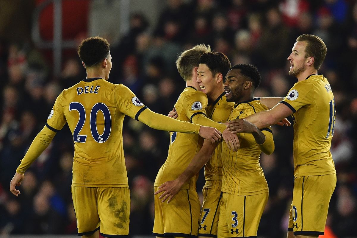Tottenham Hotspur’s South Korean striker Son Heung-Min © celebrates with teammates after scoring their third goal during the English Premier League football match between Southampton and Tottenham Hotspur at St Mary’s Stadium in Southampton. Photo: AFP