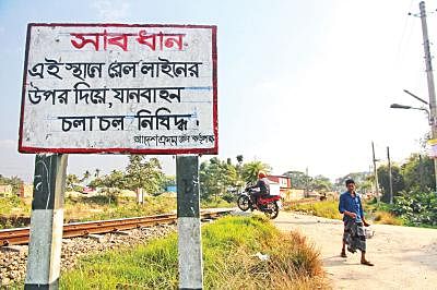 This cautionary notice is put at a railroad crossing. Photo: Anis Mahmud