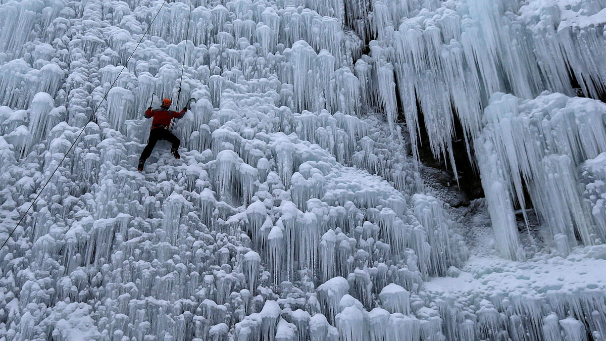 A man climbs an artificial wall of ice in the city of Liberec, Czech Republic, January 12, 2017. Photo: Reuters