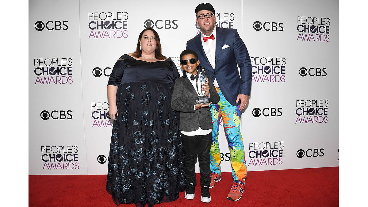 Actors Chris Sullivan, Lonnie Chavis and Chrissy Metz, winners of the Favorite New TV Drama, `This is Us`, pose in the press room during the People`s Choice Awards 2017 at Microsoft Theater on January 18, 2017 in Los Angeles. AFP