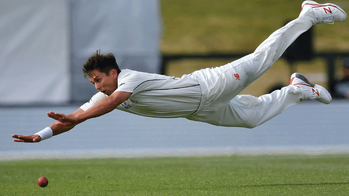 New Zealand`s Trent Boult fields the ball during day one of the second international Test cricket match between New Zealand and Bangladesh at Hagley Park Oval in Christchurch on January 20, 2017. AFP