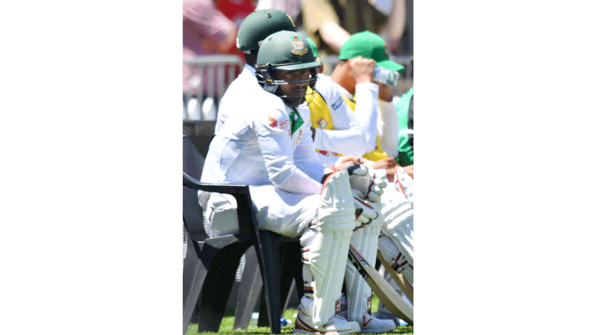 Imrul Kayes waits to bat after returning from an injury on day five of the first international Test cricket match between New Zealand and Bangladesh at the Basin Reserve in Wellington on January 16, 2017. AFP