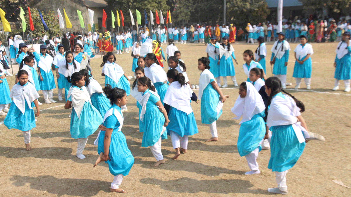 Girls are playing during the annual sports day programme at Faridpur government girls high school ground on Monday. Photo: Alimuzzaman