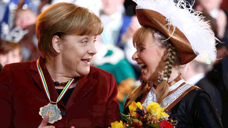 German Chancellor Angela Merkel and Sarah Philips during a reception of German carnival societies at the Chancellery in Berlin, Germany.  Photo: Reuters